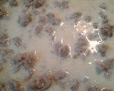 A picture of step 2 of Applesauce and Sausage Sauce.