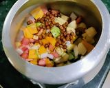 A picture of step 1 of Palanga Ghadghada Tarkari (Spinach and Veggies Curry).