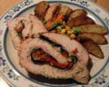 A picture of step 12 of spinach and pepper stuffed pork loin with parmesan potato wedges and mixed veggies.