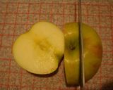 A picture of step 2 of An Easy Way to Cut Apples.