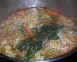 A picture of step 11 of Cabbage and carrot Soup.