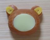 A picture of step 12 of Korilakkuma Bento with Mini Sausages.