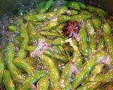 A picture of step 1 of Chinese-Style Spicy Edamame.