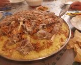صورة لخطوة 10 من وصفة منسف