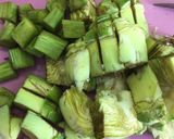 Foto del paso 2 de la receta Arroz caldoso con alcachofas, ajos tiernos y pollo