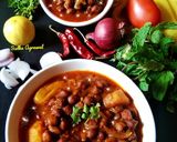 A picture of step 5 of Desi-Style Chana Aloo (Desi-Style Chickpea and Potato Curry).