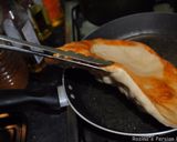 A picture of step 14 of ِDough fried pizza.