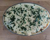 A picture of step 4 of Mousaka with bechamel sauce.