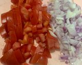 A picture of step 2 of Sweet and sour Tomato Curry serve with white rice.