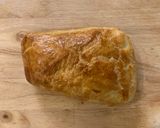 A picture of step 5 of Baked Brie in Puff Pastry.