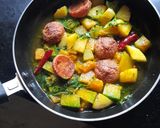 A picture of step 5 of Pumpkin curry.