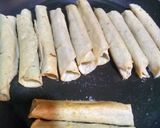A picture of step 2 of Chicken Flautas.