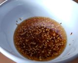 A picture of step 6 of Chicken Arroz Caldo.