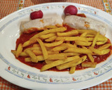 Foto del paso 13 de la receta: Lomos de merluza con pisto y patatas fritas Exprés