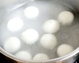 A picture of step 4 of Sweet Rice Wine Sesame Dumplings.