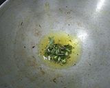 A picture of step 1 of Baigan Tomato Curry.