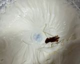 A picture of step 3 of Cream and Lotus Cookie Dessert in a Glass.
