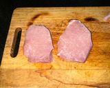 A picture of step 1 of Pork Schnitzel (optional spicy).