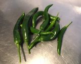 Une image de l'étape 1 de Cotes de porc grillées,marinées aux pommes de terre et piments verts.