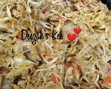 A picture of step 1 of Dambun Kaza(Chicken flakes).