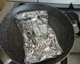 A picture of step 1 of Risotto with fresh salmon fillet and saffron.