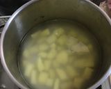A picture of step 1 of Potato mash with onion and cheese.
