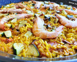 Foto del paso 9 de la receta: Arroz con rodaja de pota, langostinos y calabacín