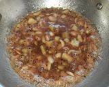 A picture of step 3 of Raw mango,garlic pickle.