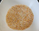 A picture of step 1 of Arhar Dal Khichdi.
