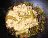 A picture of step 4 of Pui Shak Diye Bhaja Muger Dal (Roasted Moong Dal Cooked with Malabar Spinach - Bong Style).
