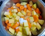 A picture of step 2 of Pumpkin and Carrot Soup.