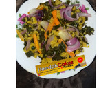 A picture of step 3 of Dambun couscous with moring leaves and carrot.