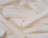 A picture of step 1 of Baked Potato Wedges.