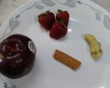 A picture of step 1 of Strawberry Apple water.