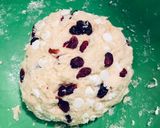 A picture of step 5 of SCONES with red berries & white chocolate chips!! 🍓🥛.