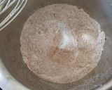 A picture of step 3 of Eggless Layered chocolate strawberry orange cake.