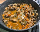 Une image de l'étape 20 de Sauté de porc aux champignons, carottes et tomates.