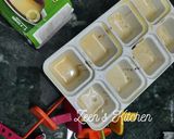 A picture of step 3 of Cream Caramel Popsicles.