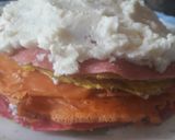 A picture of step 6 of Eggless rainbow cake.