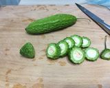A picture of step 1 of Bitter Gourd Omelette.