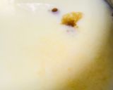 A picture of step 1 of Swiss roll mangoes custard loaded with walnuts.