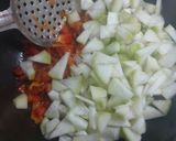 A picture of step 3 of Lauki coconut masala.