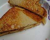 A picture of step 4 of Apple butter peanut butter cashew butter banana sandwich.