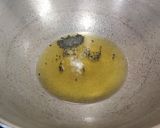 A picture of step 2 of Sem Aloo with Kalonji Seeds.