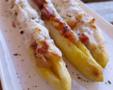 Foto del paso 9 de la receta: Espárragos blancos gratinados rellenos de panceta ibérica y nueces