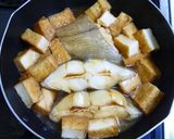 A picture of step 7 of Mom's Simmered Flounder.