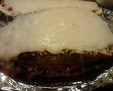 A picture of step 12 of Audrey's Italian Stuffed Zucchini.
