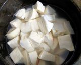 A picture of step 1 of Tapioca (Kappa) Kerala Style.