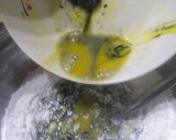 A picture of step 1 of Homemade fresh squid ink pasta with prawns and squid.