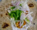 A picture of step 5 of Chapati roll with less oil.